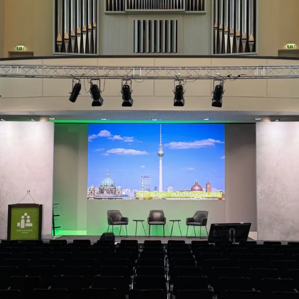 Stage back wall hall behind chairs 