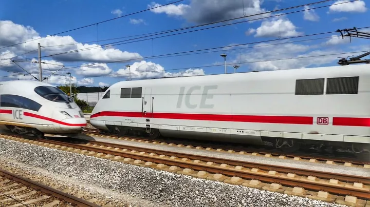 Kreuzende ICE Züge auf Bahngleisen