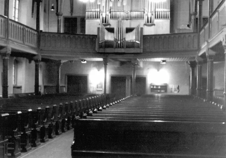 Black and white picture of a church hall